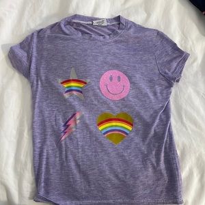 Adorable purple shirt with graphics